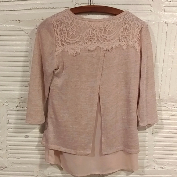 Adiva size small 2 layer top with open detail in the backWelcome to Poshmark. - Picture 5 of 5